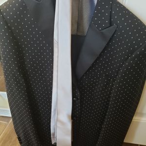 Brand new black suit and tie